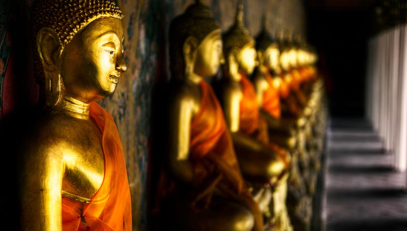 Row of statues in Thailand